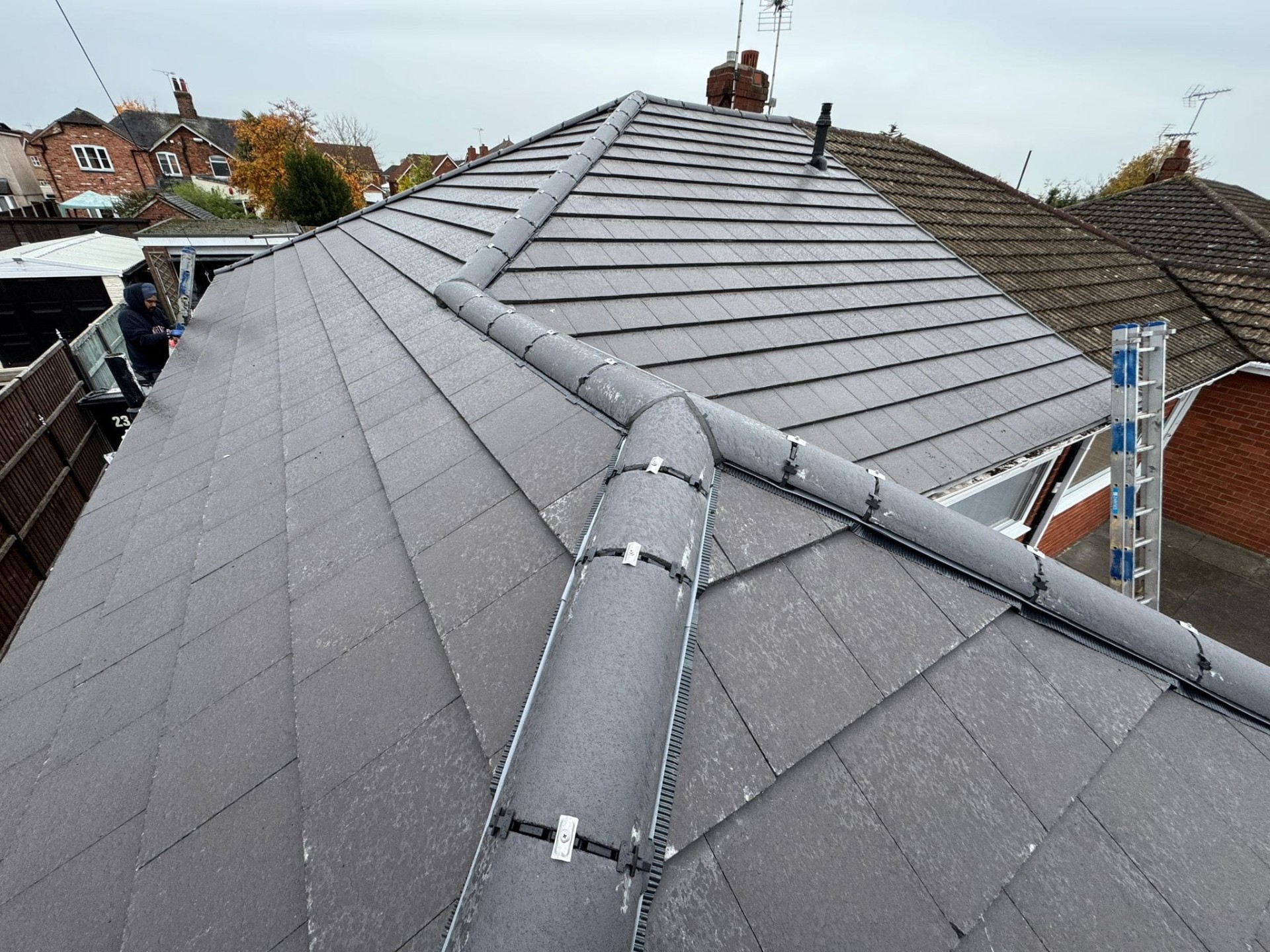 New slate roof with mechanical ridge fixings completed by Keystone Roofing in Stoke-on-Trent